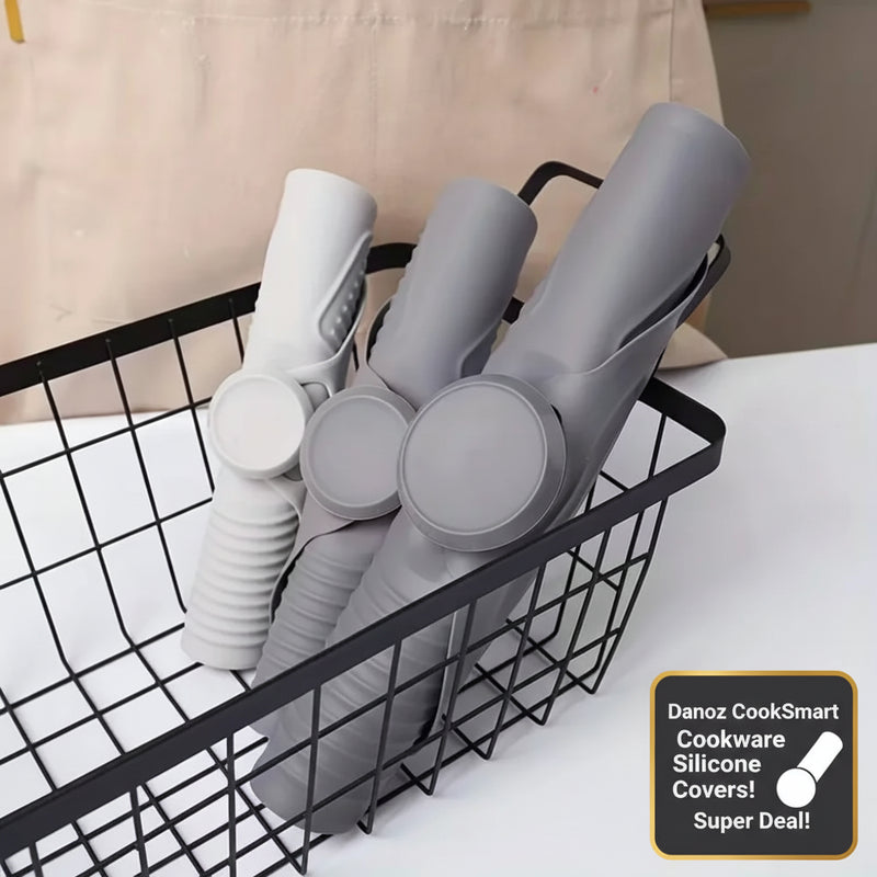 Gray hair straighteners in a black wire basket on a white surface