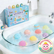 Colorful bath bombs in a bathtub with their packaging in the background.