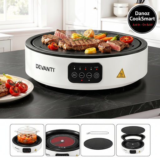 A Devanti electric multi-functional grill and cooker shown on a kitchen countertop with steak, vegetables, and a plate of food. The main product is white with a black control panel and black cooking surface.