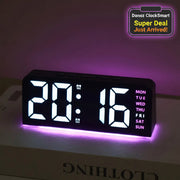 Digital clock with large LED display on a dark background