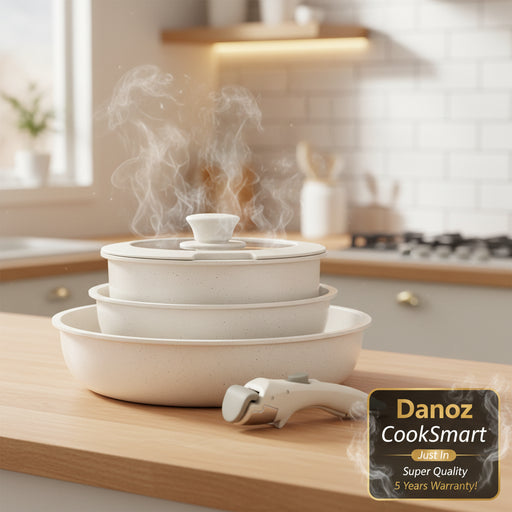 Set of ceramic cookware with a lid and handle on a white background, featuring the brand 'Komorela'.
