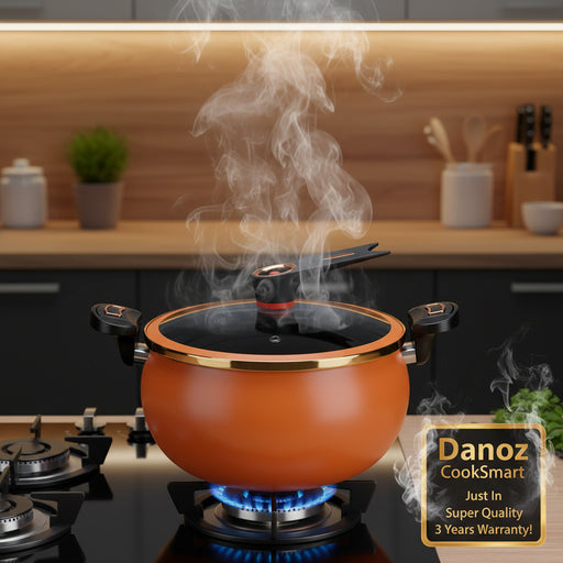 Orange pressure cooker with exhaust valve on a white background