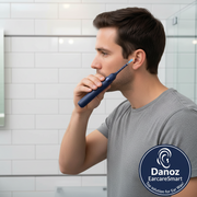 Set of ear cleaning tools including a blue handheld device, attachments, and a smartphone app displayed.