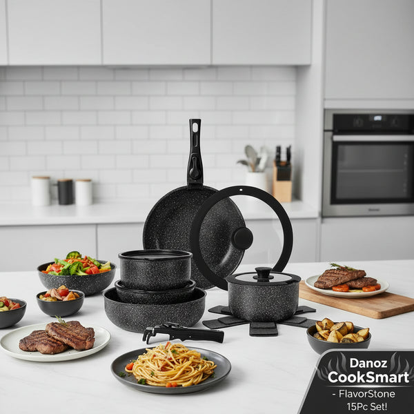 Set of black speckled cookware on a kitchen counter with food.