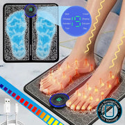 Foot massager mat with digital display and foot placement illustration on a marble floor.