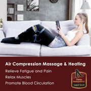 Woman using an air compression massage and heating device on a couch
