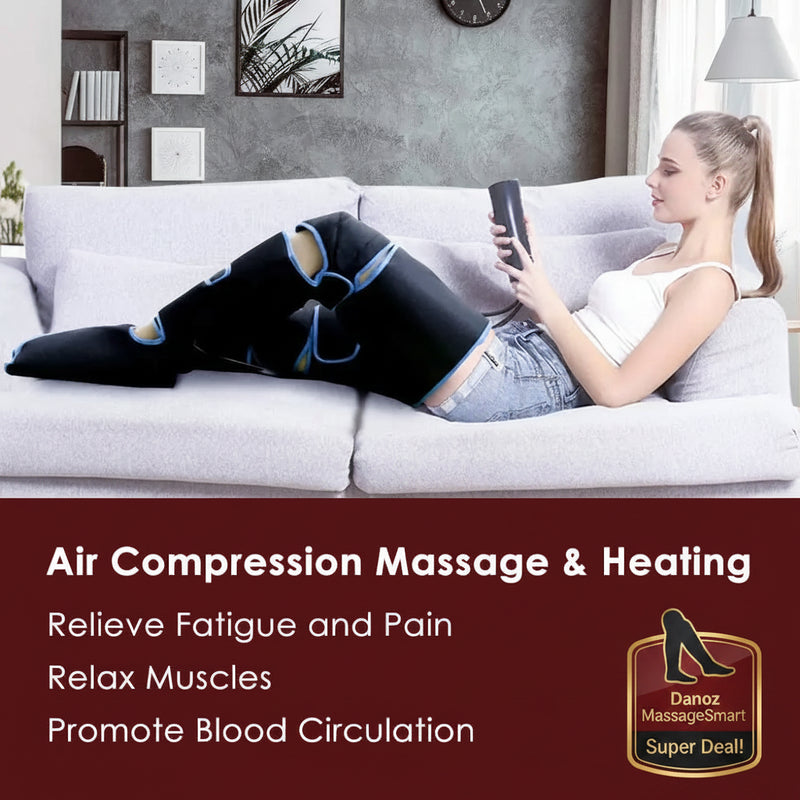 Woman using an air compression massage and heating device on a couch