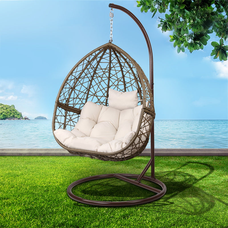 Indulge in the art of outdoor living with Danoz EggPod, crafted suspended retreat. Constructed from hand-woven, UV-resistant wicker and supported by a powder-coated steel frame!