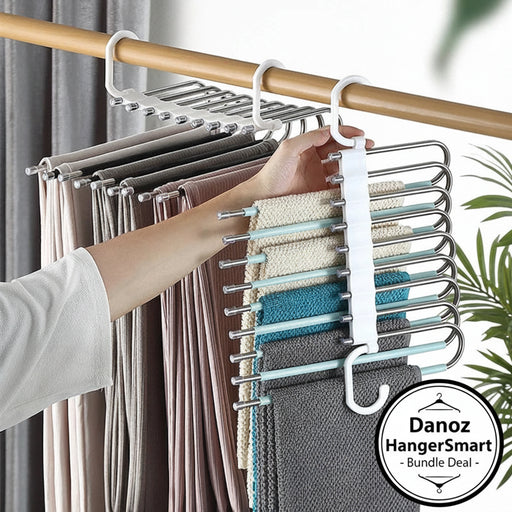 Multi-layered hanger with clothes on a wooden rod