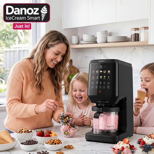 Woman and children in a kitchen with a Ice cream -making machine, surrounded by food items.