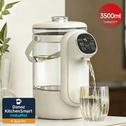 White electric kettle with digital display pouring water into a glass on a light surface.