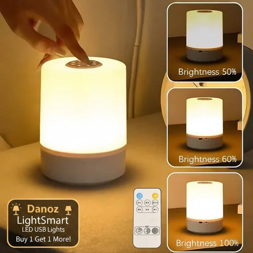 Smart night light with remote control and brightness display on a table.