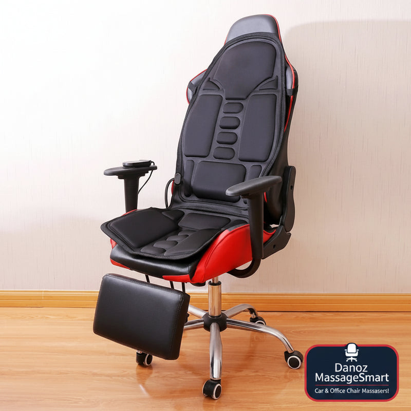 Black and red office chair with massage functions on a wooden floor.