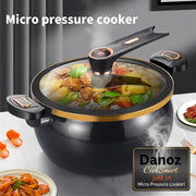 Black micro pressure cooker with food inside on a marble surface