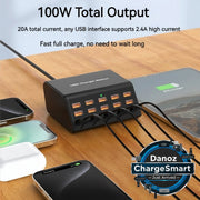 USB charger station with multiple devices charging on a wooden surface
