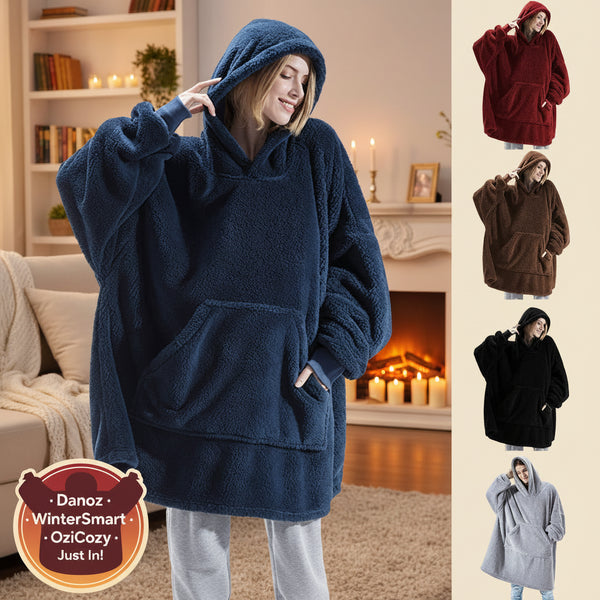 Blue fleece poncho with hood worn by a person, displayed against a white background.