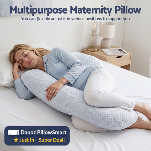 A woman lies on a bed using a light blue textured maternity pillow for support. The image includes text at the top reading 'Multipurpose Maternity Pillow' with a subtitle about adjustable positioning.