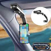 Car phone holder mounted on a car's sun visor with a close-up inset showing the arm mechanism.