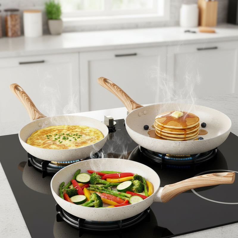 Set of three stone cookware pieces with wooden handles on a white background