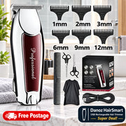 A professional hair clipper kit shown on a white background, including a silver clipper with a dark red panel, nine black guide combs labeled 1mm to 12mm, two scissors, a comb, a black cape, and a charging cable. The clipper has the word 'Professional' printed vertically on the front.