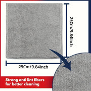 Gray cleaning pad with dimensions and text about anti-lint fibers on a white background