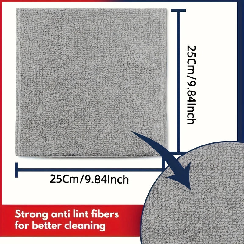 Gray cleaning pad with dimensions and text about anti-lint fibers on a white background
