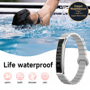 Person swimming with a digital watch on wrist, emphasizing water resistance features.