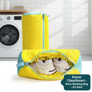 Yellow shoe bag with a white dryer in the background