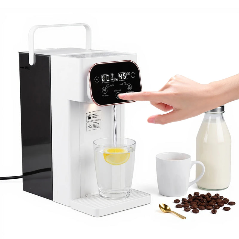 White and black countertop coffee maker with a hand pressing a button, surrounded by coffee ingredients.