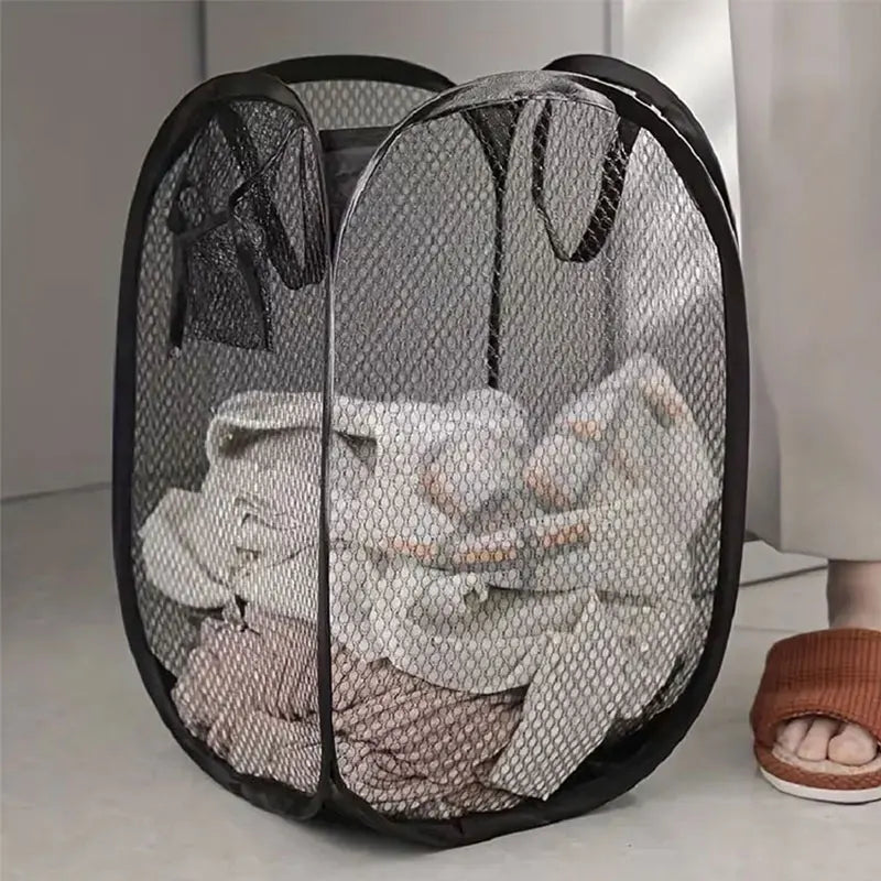 Buy 1 Get 1 Free - Tackle laundry day with a smile using Danoz Mesh Pop-up Laundry Basket! With its roomy, breathable mesh design, it keeps your dirty clothes fresh and well-ventilated