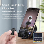 Hand holding a small device next to a smartphone on a wooden surface with text describing its functions.
