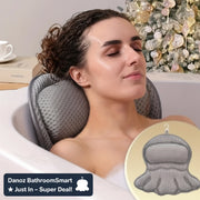 Woman relaxing with a neck pillow in a bathtub, Christmas tree in the background