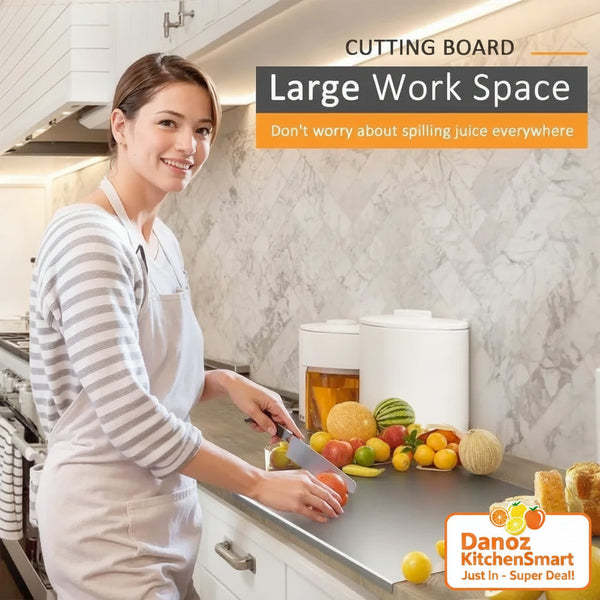 Woman in a kitchen using a large cutting board with text about a large work space.