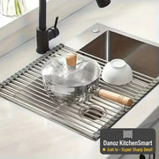 Stainless steel kitchen rack with dishes on a kitchen counter