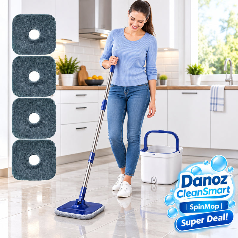 A white and blue spin-and-wash mop bucket set with a long silver handle and a flat mop head, shown alongside four dark gray square cleaning pads on a plain white background.