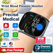 Wrist blood pressure monitor on a person's arm with product features highlighted.