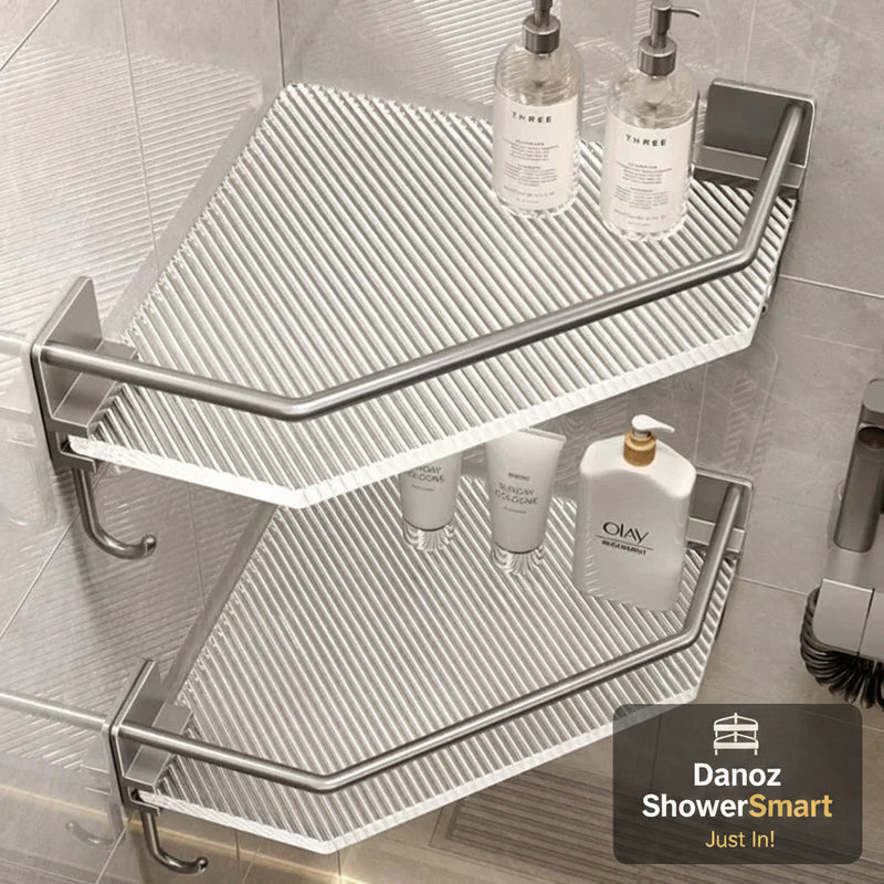 Corner shower caddy with bath products on a tiled shower wall