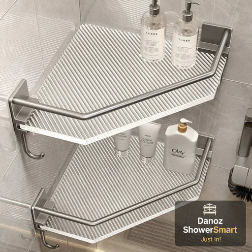 Corner shower caddy with bath products on a tiled shower wall