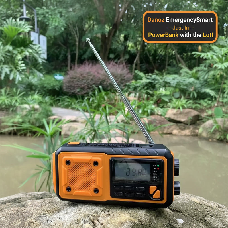 Orange and black radio with antenna on a rock in a garden setting
