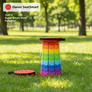 Colorful folding stool with measurement details on a white background