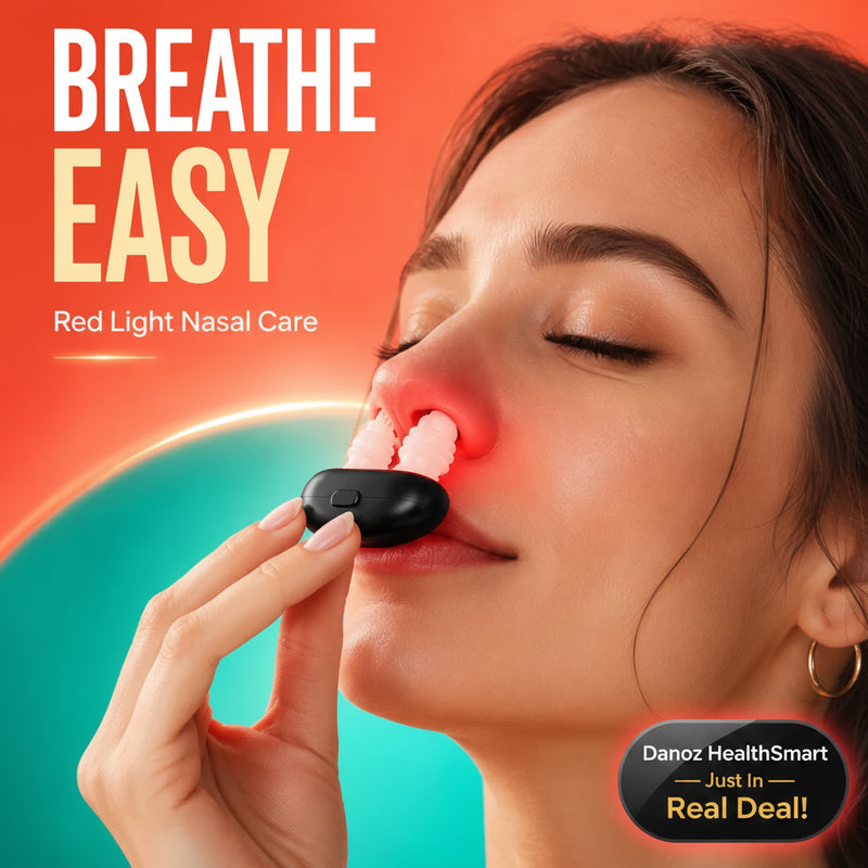 A woman with her eyes closed holds a black red light nasal care device to her nose, with a glowing red light illuminating the nostrils. The background is a vibrant split of orange and teal, with the text 'BREATHE EASY' and 'Red Light Nasal Care' in the upper left.