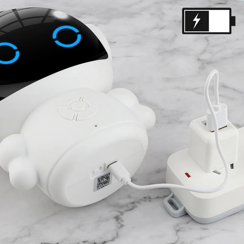 White electronic device with blue lights on a marble surface, plugged into an outlet.