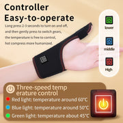 Hand wearing a heating pad with temperature control indicators on a beige background
