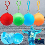 Four colorful keychain balls with a blue open egg and a person in a blue raincoat.