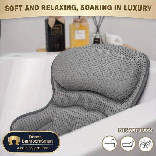 Gray bath pillow on a bathtub with text 'Soft and Relaxing, Soaking in Luxury' and icons indicating it fits various tubs.