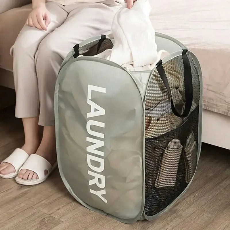 Buy 1 Get 1 Free - Tackle laundry day with a smile using Danoz Mesh Pop-up Laundry Basket! With its roomy, breathable mesh design, it keeps your dirty clothes fresh and well-ventilated