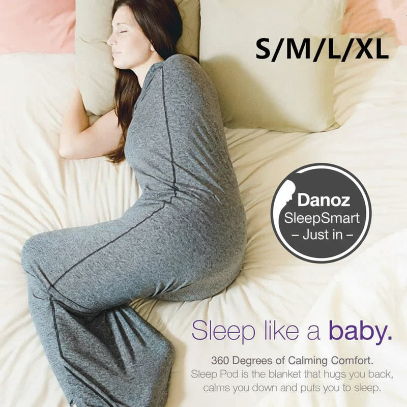 Person wearing a gray Sleep Pod on a bed with size options displayed.