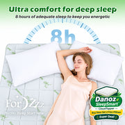 A woman lies on her back on a white mattress with two white pillows, under a green-to-white gradient background with text reading 'Ultra comfort for deep sleep' and '8 hours of adequate sleep to keep you energetic.'.