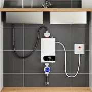 Water heater attached to a wall with plumbing in a bathroom setting