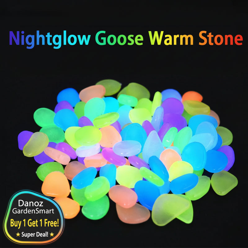 Colorful glow stones with text 'Nightglow Goose Warm Stone' on a black background